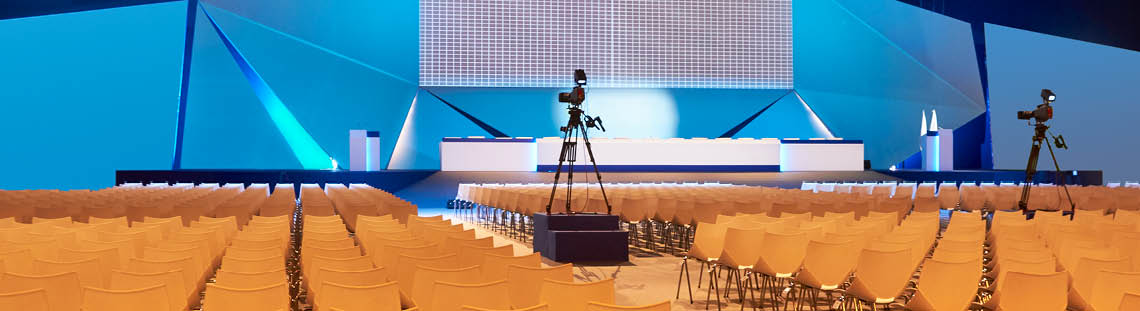 Conference hall. Convention center with podium. Professional meeting. Auditorium
