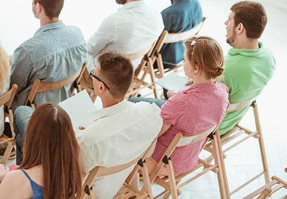 The people at Business Meeting in the empty conference hall. Business and Entrepreneurship concept.