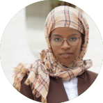Successful interracial business team with tablet posing outside. Businessman and Muslim businesswomen standing outdoors, holding tablet and looking at camera. Diverse colleagues conce